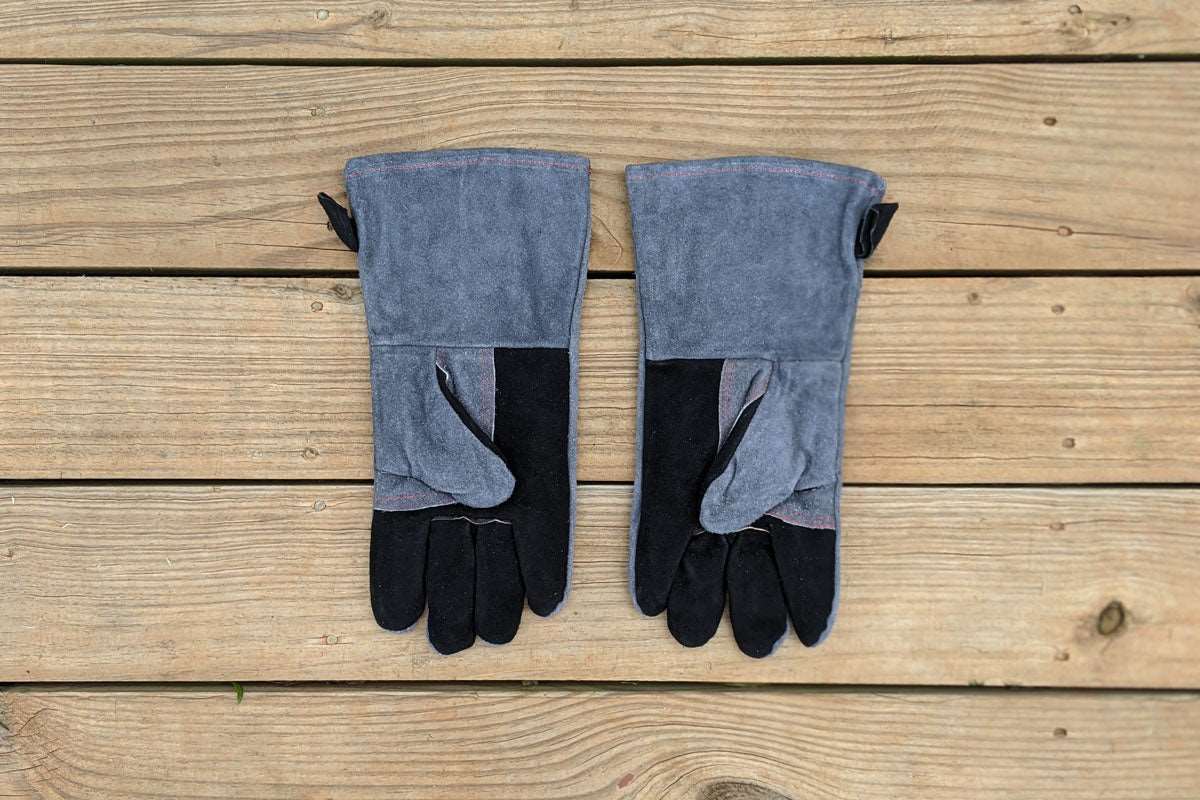 Whether you're spinning your EasySpin™ Grill Grate to get the perfect sear or handling hot coals, you'll want to reach for these SnS Grills branded gloves first!