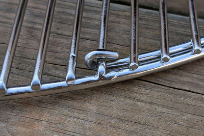 Designed to match the width of the Slow 'N Sear® XL, the single opening streamlines grate functionality while making it easier to access fuel in the basket. Two-zone cooking enthusiasts and Cold Grate Technique lovers rejoice! Made from high quality 304 stainless steel, this grate will simplify and elevate any cook.  | SnS Grills