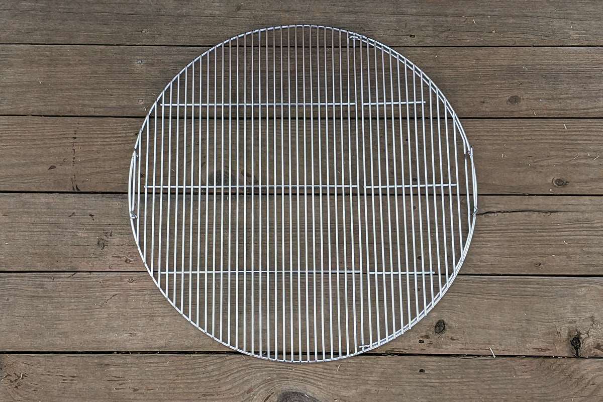 Designed to match the width of the Slow 'N Sear® XL, the single opening streamlines grate functionality while making it easier to access fuel in the basket. Two-zone cooking enthusiasts and Cold Grate Technique lovers rejoice! Made from high quality 304 stainless steel, this grate will simplify and elevate any cook.  | SnS Grills