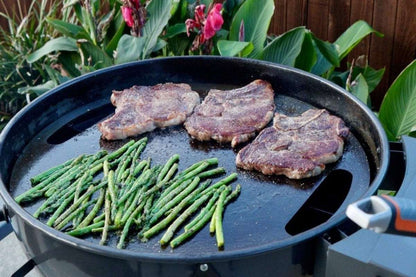 The carbon steel Plancha from SnS Grills provides a smooth, flat top cooking surface with excellent thermal conductivity, which is perfect for smash burgers, Philly cheesesteaks, Hibachi style meals, breakfast and much more. Once seasoned, the natural non-stick cooking surface makes the Plancha easy to cook with and also very easy to clean and maintain.